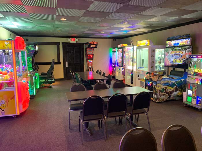 Arcade room at Jacque B's Kitchen & Cocktails in Montrose Minnesota, with games and drinks.