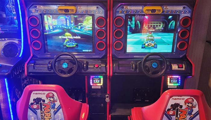 Two side-by-side Mario Kart arcade racers perfect for Restaurant fun, Food, and Drink breaks.