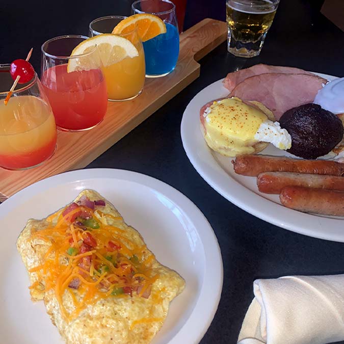 Colorful drinks and hearty food from Jacque B's Kitchen & Cocktails brighten any breakfast plate.